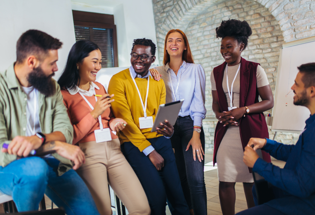 Team enjoying themselves as they undergo a leadership training session.  